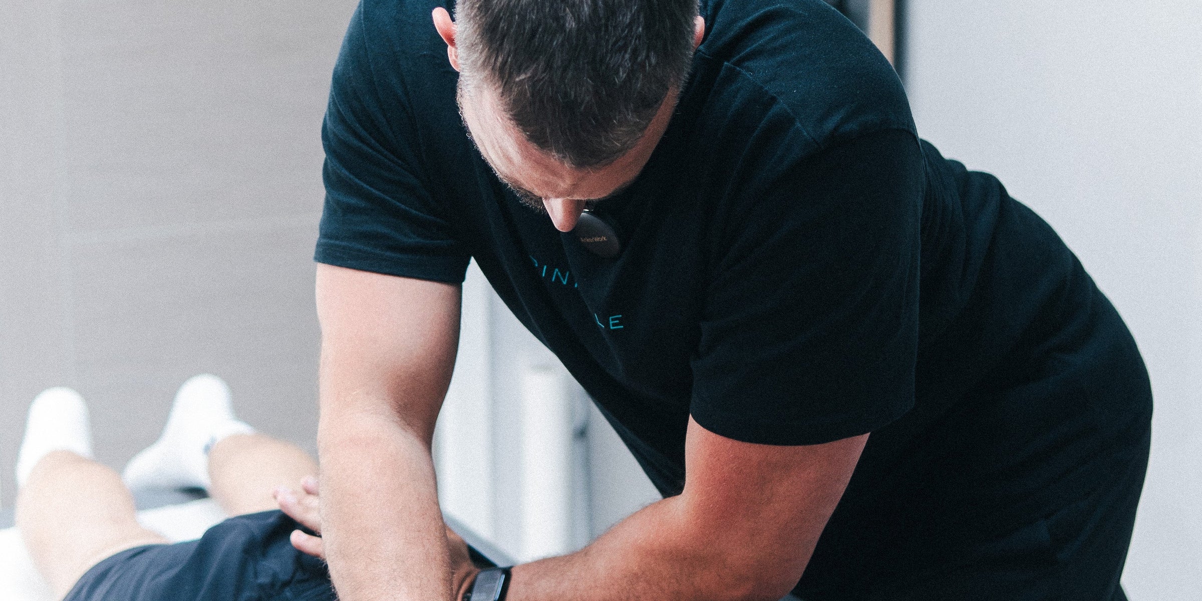 Osteopath treating low back pain 